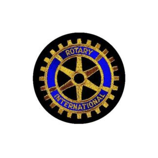 Badge du Rotary brodé à la machine